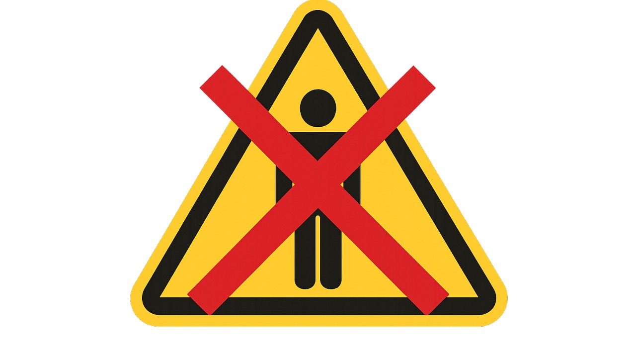 Warning symbol crossed out to illustrate that human error is a clue, not a cause